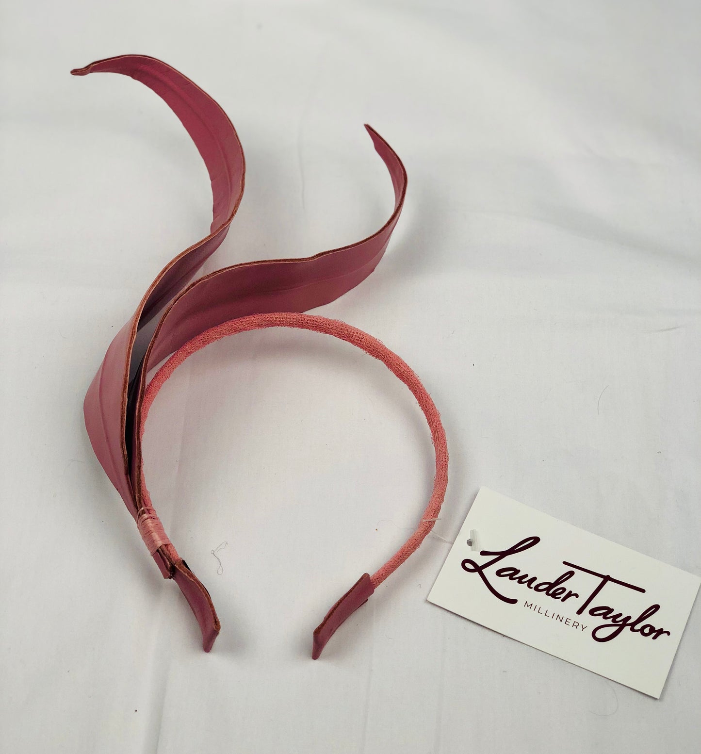 Millinery | Pink leather feather