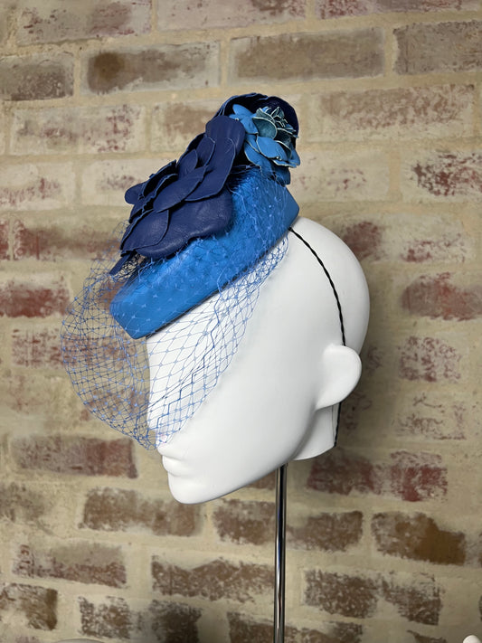Millinery | Blue leather button